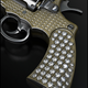 Illustration for article titled Worlds Smallest Gun Now In Gold and Diamonds, Kills Just the Same